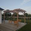 Pergola poteaux robinier écorcés et poncés