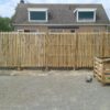 Dubbele Franse rondhoutpoort van 200 cm hoog met latten aan beiden kanten