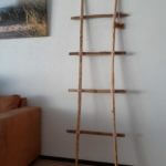 Kastanje rasterlatten van 200 cm lang 1/4 lat gepunt waar een decoratieve ladder van is gemaakt