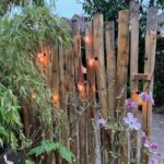Kastanje paal 300 cm lang, diameter 10/12 cm, gepunt, sfeerverlichting